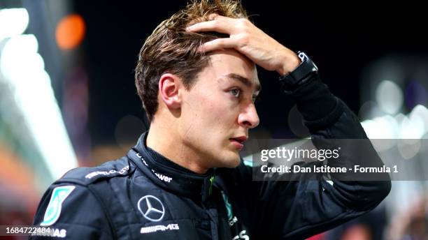 Second placed qualifier George Russell of Great Britain and Mercedes looks on in parc ferme during qualifying ahead of the F1 Grand Prix of Singapore...