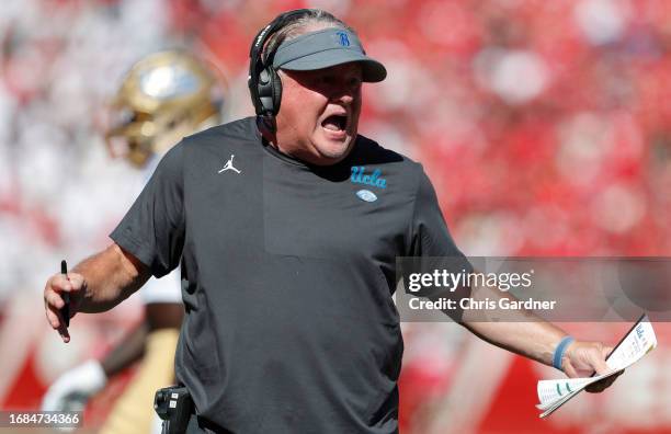 Chip Kelly head coach of the UCLA Bruins argues a call during the first half of their game against the Utah Utes at Rice-Eccles Stadium on September...