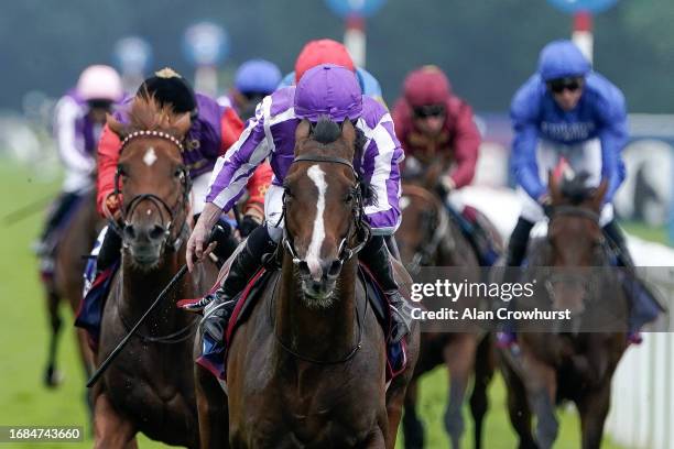 Ryan Moore riding Continuous win The Betfred St Leger Stakes at Doncaster Racecourse on September 16, 2023 in Doncaster, England.