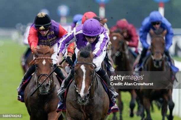 Ryan Moore riding Continuous win The Betfred St Leger Stakes at Doncaster Racecourse on September 16, 2023 in Doncaster, England.