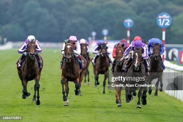 Ryan Moore riding Continuous win The Betfred St Leger Stakes at Doncaster Racecourse on September 16, 2023 in Doncaster, England.