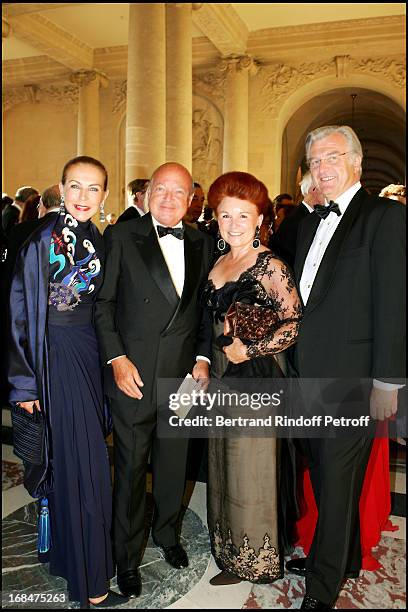 Baron and Baroness Emmanuel Reille and the Count and Countess Jerome De Witt at Dinner To Benefit The Sovereign Military Order Of Malta In Versailles.
