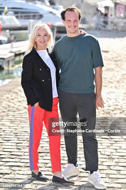 Sylvie Testud and Johann Cuny attend the "Knok" Photocall during the 25th La Rochelle Fiction Festival on September 16, 2023 in La Rochelle, France.
