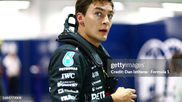 Second placed qualifier George Russell of Great Britain and Mercedes looks on in parc ferme during qualifying ahead of the F1 Grand Prix of Singapore...