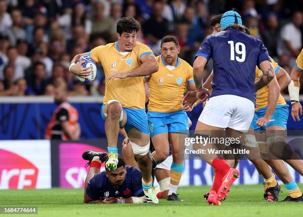 Felipe Aliaga of Uruguay runs with the ball during the Rugby World Cup France 2023 match between France and Uruguay at Stade Pierre Mauroy on...