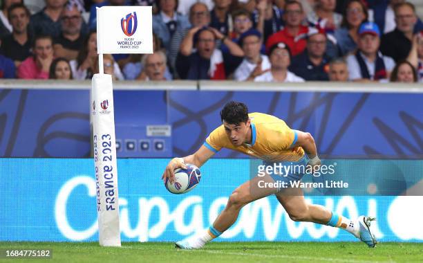 Baltazar Amaya of Uruguay scores his team's second try during the Rugby World Cup France 2023 match between France and Uruguay at Stade Pierre Mauroy...