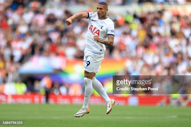 Richarlison of Tottenham Hotspur celebrates after scoring the team's first goal during the Premier League match between Tottenham Hotspur and...