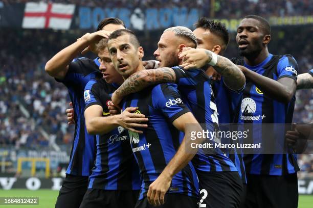 Henrikh Mkhitaryan of Inter Milan celebrates with team mates after scoring their sides first goal during the Serie A TIM match between FC...