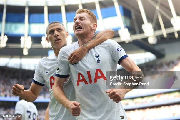 Dejan Kulusevski of Tottenham Hotspur celebrates with teammate Richarlison after scoring the team's second goal during the Premier League match...