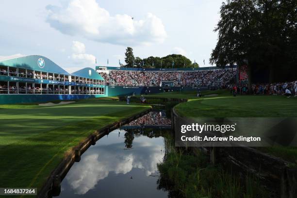 Matt Fitzpatrick of England plays his fourth shot on the 18th hole during Day Three of the BMW PGA Championship at Wentworth Golf Club on September...