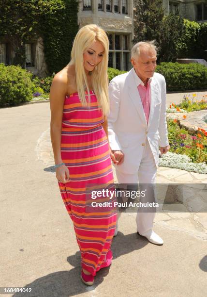Playboy Founder Hugh Hefner and his wife Playboy Playmate Crystal Hefner attend the 2013 Playmate Of The Year announcement at The Playboy Mansion on...
