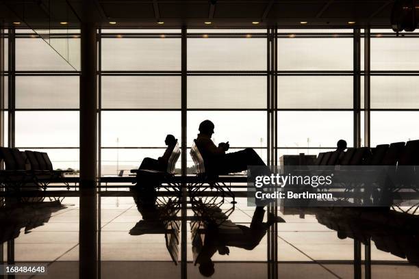 modern airport - crowded airplane stock pictures, royalty-free photos & images