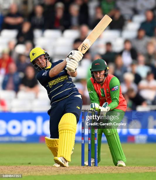 Liam Dawson of Hampshire bats watched by Leicestershire wicketkeeper Harry Swindells during the Metro Bank One Day Cup Final between Leicestershire...