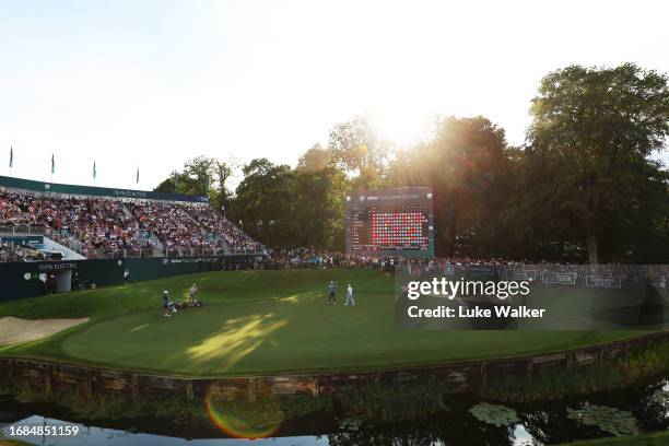 Jon Rahm of Spain acknowledges the crowd after putting on the 18th green during Day Three of the BMW PGA Championship at Wentworth Golf Club on...