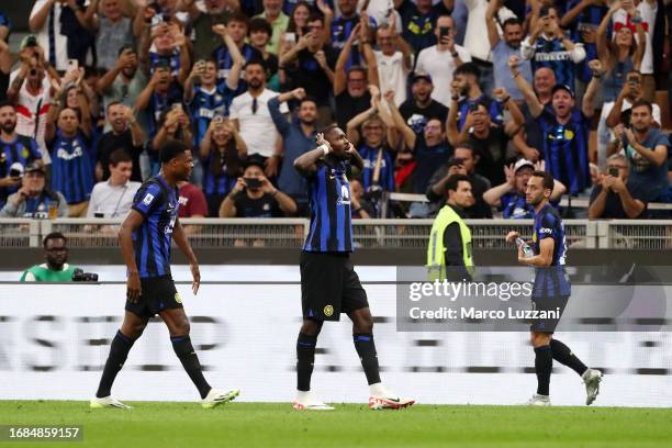 Marcus Thuram of Inter Milan celebrates after scoring the team's second goal during the Serie A TIM match between FC Internazionale and AC Milan at...