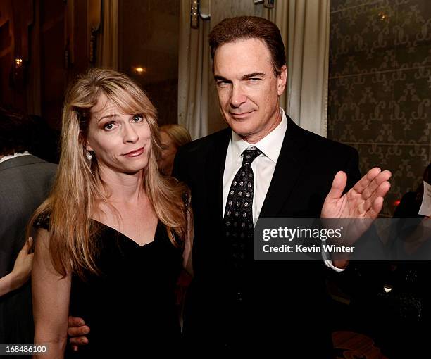 Actor Patrick Warburton and his wife Cathy arrive at the 13th Annual Lupus LA Orange Ball at the Beverly Wilshire Hotel on May 9, 2013 in Beverly...
