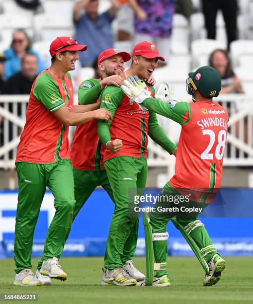 Will Davis of Leicestershire celebrates with teammates after catching out Joe Weatherley of Hampshire during the Metro Bank One Day Cup Final between...