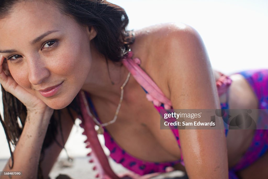 Woman lying on beach