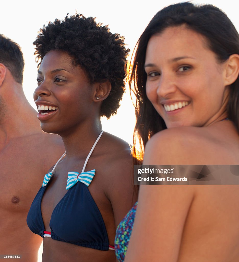 Women playing together on beach