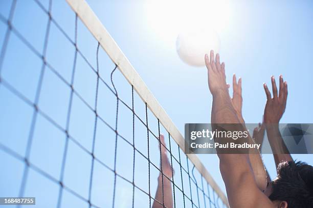 people playing volleyball - beachvolleyball stock pictures, royalty-free photos & images