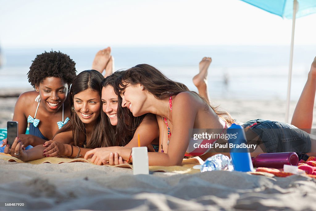 Women sunbathing on beach
