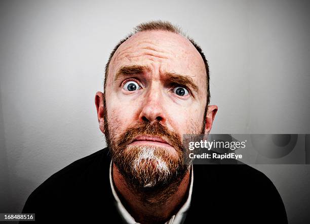 man frowning, desperate, disbelieving and panic stricken - rea001 stock pictures, royalty-free photos & images