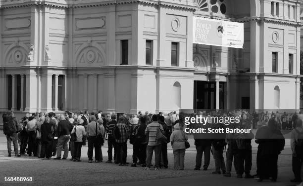 Long line of stamp enthusiasts queue to enter the World Stamp Expo on May 10, 2013 in Melbourne, Australia. The World Stamp Expo is the largest...