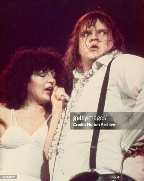 American singer Meat Loaf performs the duet 'Paradise By The Dashboard Light' on stage with singer Karla Devito, Circa 1978.