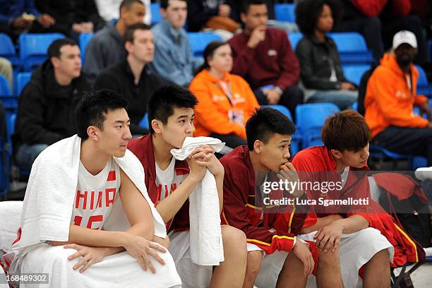 Players look on from the bench during the Nike International Junior Tournament game between Lietuvos Rytas Vilnius v Team China at London Soccerdome...