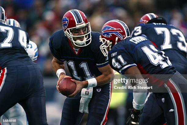 Quarterback Drew Bledsoe and Fullback Phillip Crosby of the Buffalo Bills talk strategy during the NFL game against the Detroit Lions at the Ralph...