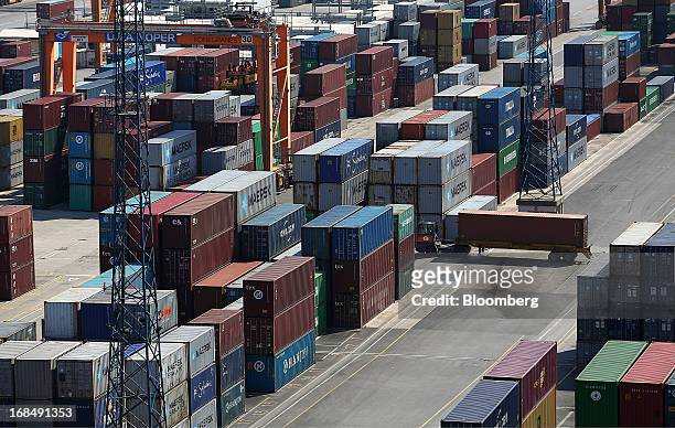 Shipping containers stand on the dockside at the port of Koper, operated by Luka Koper d.d., in Koper, Slovenia, on Thursday, May 9, 2013. The former...