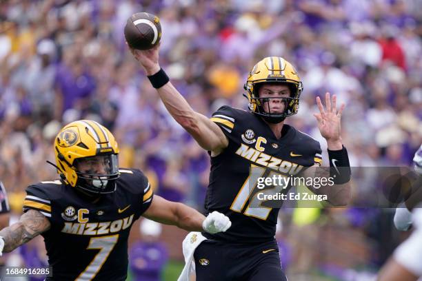 Quarterback Brady Cook of the Missouri Tigers passes against the Kansas State Wildcats in the first half at Faurot Field/Memorial Stadium on...