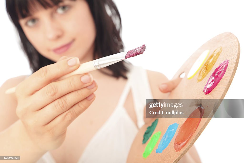 Young woman painting