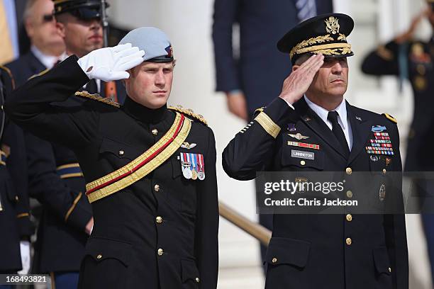 Prince Harry wearing his No. 1 ceremonial uniform of The Blues and Royals as he pays his respects to the victims of the Afghanistan conflict and the...