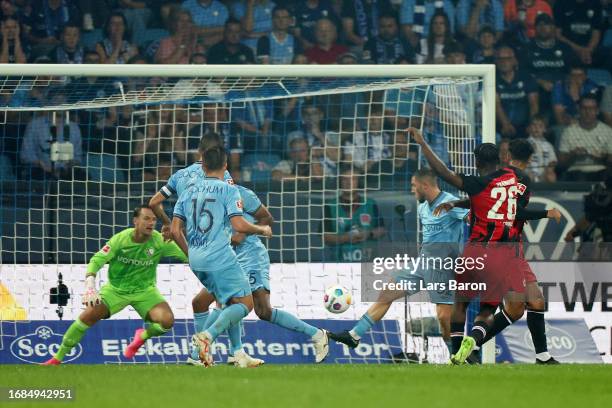 Junior Dina Ebimbe of Eintracht Frankfurt scores their sides first goal past bocduring the Bundesliga match between VfL Bochum 1848 and Eintracht...