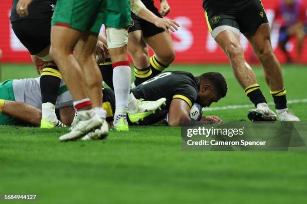 Taulupe Faletau of Wales scores his team's fourth try during the Rugby World Cup France 2023 match between Wales and Portugal at Stade de Nice on...