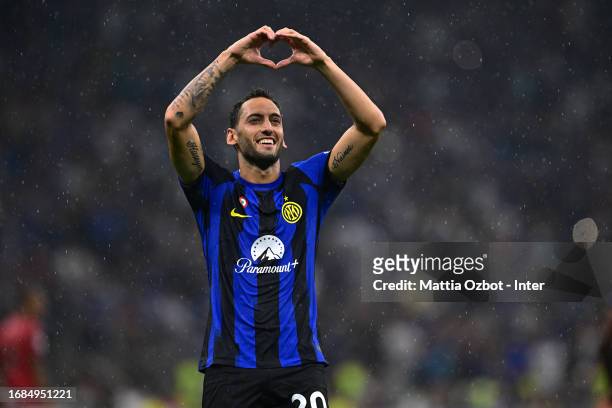 Hakan Calhanoglu of FC Internazionale celebrates after scoring their team's fourth goal during the Serie A TIM match between FC Internazionale and AC...