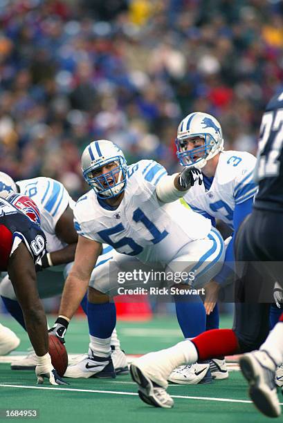 Center Dominic Raiola of the Detroit Lions waits to make the snap during the NFL game against the Buffalo Bills at the Ralph Wilson Stadium on...