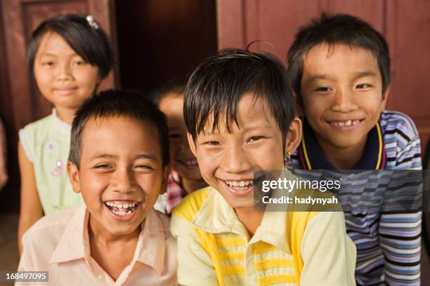 group of happy burmese children - burma stock pictures, royalty-free photos & images