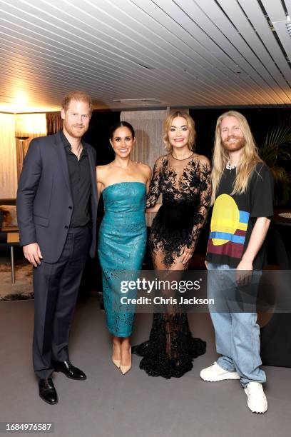 Prince Harry, Duke of Sussex, Meghan, Duchess of Sussex, Rita Ora and Sam Ryder pose before the closing ceremony of the Invictus Games Düsseldorf...