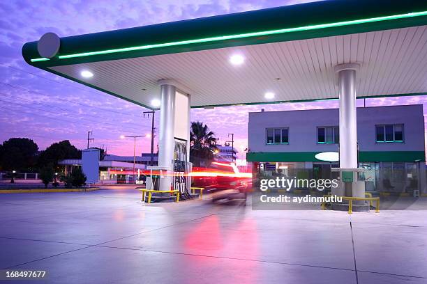 beautiful long exposure photograph of a refueling station - tank stock pictures, royalty-free photos & images