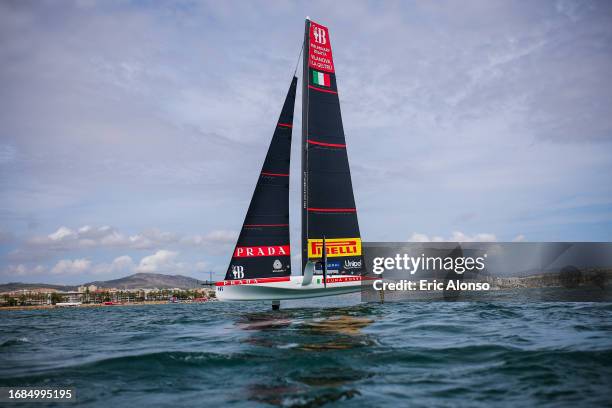 Jimmy Spithill of Australia, Francesco Bruni of Italy, Umberto Molineris of Italy, Andrea Tesei of Italy and Luna Rossa Prada Pirelli Team during the...