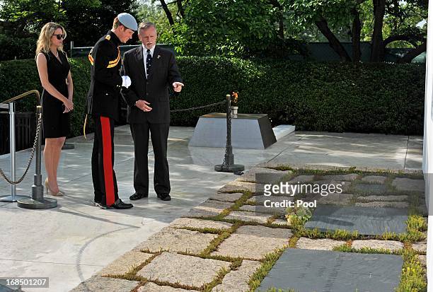 Prince Harry lays a wreath at the JFK memorial during the second day of his visit to the United States at Arlington National Cemetery on May 10, 2013...