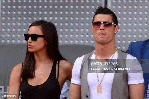 Real Madrid's Portuguese forward Cristiano Ronaldo and his girlfriend Irina Shayk attend the tennis match Spanish player Rafael Nadal against Spanish...