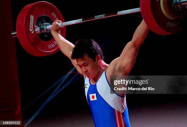 Taro Tanaka of Japan B competes in Men's 105kg during day seven of the 2013 Junior Weightlifting World Championship at Maria Angola Convention Center...