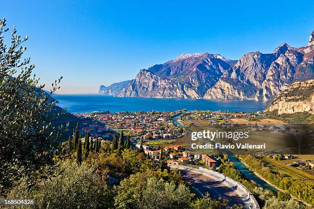 sarca river and lake garda - torbole stock pictures, royalty-free photos & images