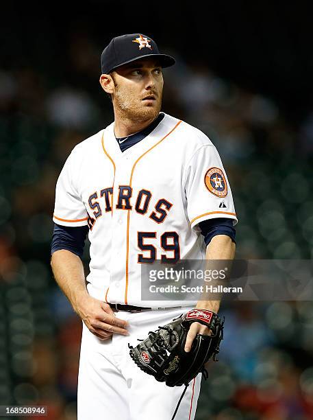 Philip Humber of the Houston Astros walks to the dugout during the game against the Los Angeles Angels of Anaheim at Minute Maid Park on May 9, 2013...