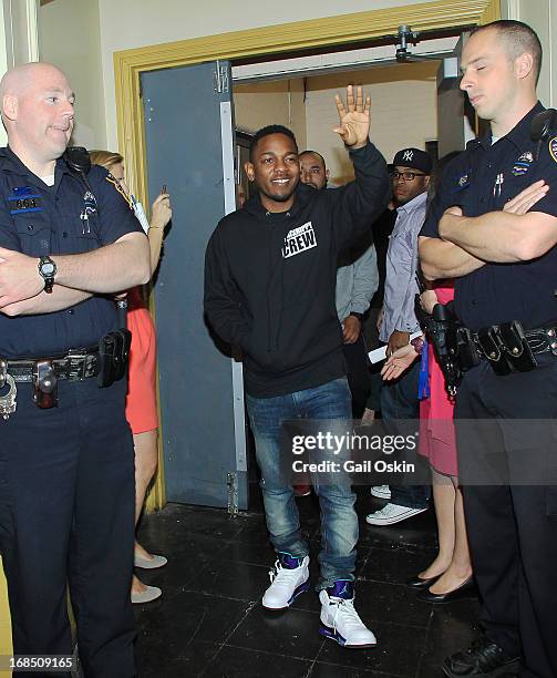 Kendrick Lamar visits Providence, Rhode Island students with the Get Schooled victory tour at the Mt. Pleasant High School on May 10, 2013 in...