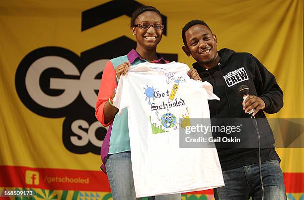 Kendrick Lamar visits Providence, Rhode Island students with the Get Schooled victory tour at the Mt. Pleasant High School on May 10, 2013 in...
