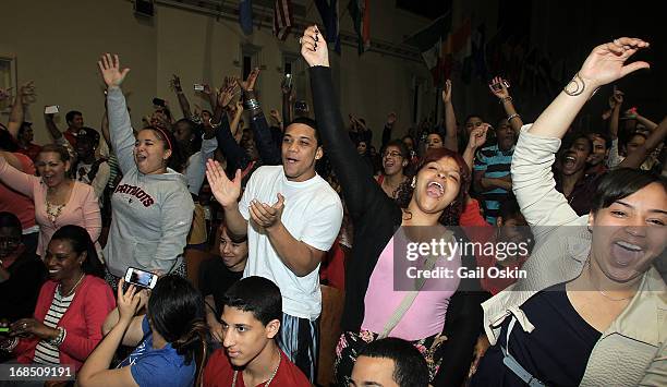 Crowd of students cheer as Kendrick Lamar walks onto the stage while visiting Providence, Rhode Island students with the Get Schooled victory tour at...